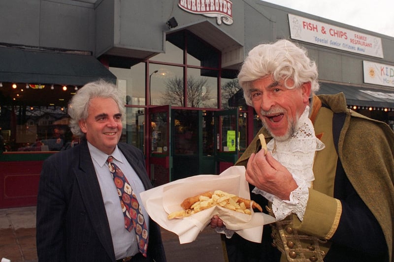 February 1997 and Aireborough Gilbert and Sullivan Society were  set to perform Ruddigore, sponsored by Murgatroyds. Pictured is Norman Davis who plays Mr Murgatroyd in the production meets restaurant owner Roger Chadwick.