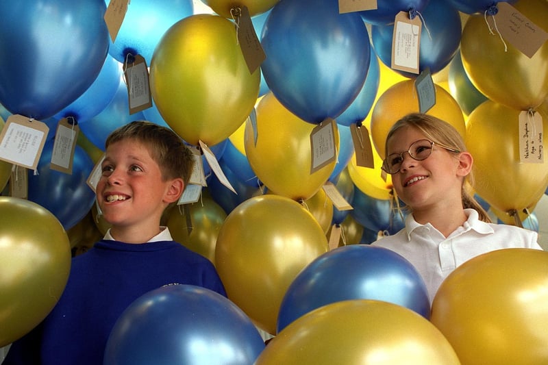 Mark Perkins and Frances Paterson with the balloons at Queensway Infants School in September 1997.