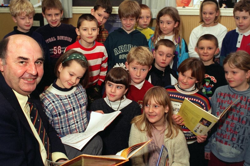 February 1997 and pictured is David Wild, temporary head at South View Junior School, with some of his pupils.