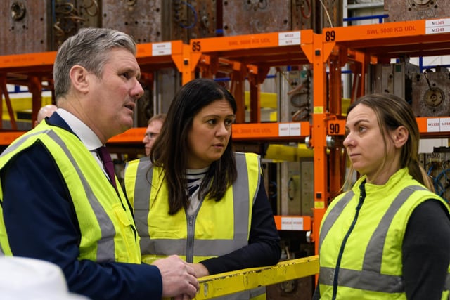 Sir Keir Starmer and Lisa Nandy MP listening to a What More worker
