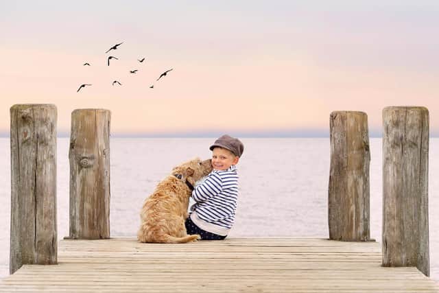 A boy's best friend, but rising costs are making owning a dog a struggle (photo: adobe)