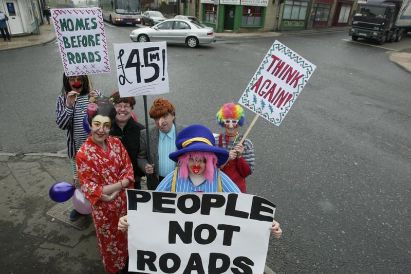 Members of Social Forum Calderdale protested in fancy dress at Hipperholme crossroads.