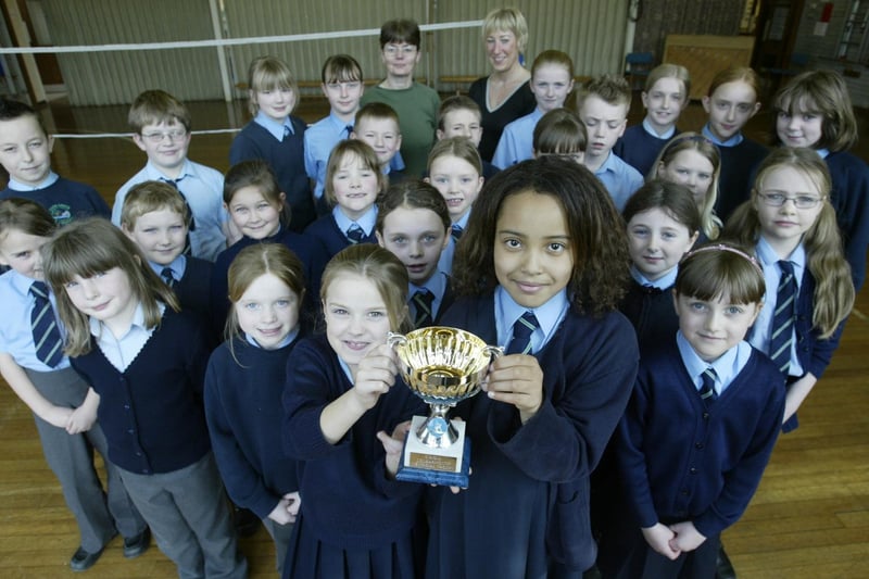 Gymnastic teams from Carr Green School, Rastrick, with the JKL warmouth trophy.