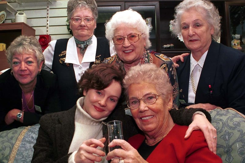 October 2000 and Chloe Newsome and shop staff at Barnado's in Cross Gates congratulate Dorothy Cook on her long service. Pictured, from left, are Jill Johnson, Betty Collett, Rose Underwood and Dolly Whitaker.