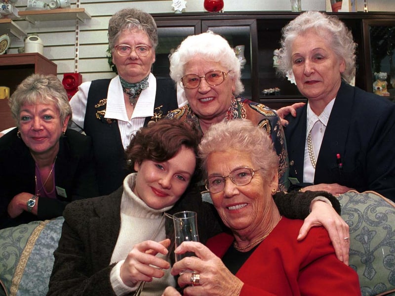 October 2000 and Chloe Newsome and shop staff at Barnado's in Cross Gates congratulate Dorothy Cook on her long service. Pictured, from left, are Jill Johnson, Betty Collett, Rose Underwood and Dolly Whitaker.