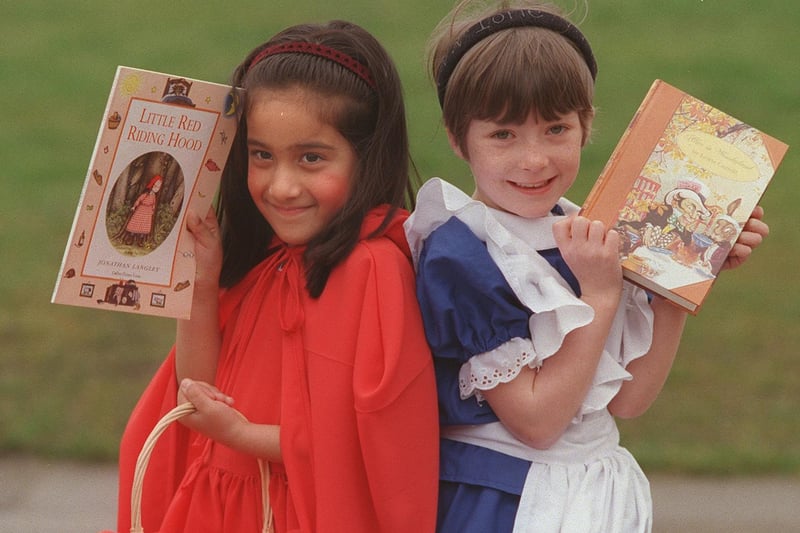 Pupils at St. Paul's Primary in Whinmoor dressed up for World Book Day in March 2000. Pictured with the books that inspired their outfits, are Nikita Panesar (Little Red Riding Hood) and Sophie de Marco (Alice in Wonderland).