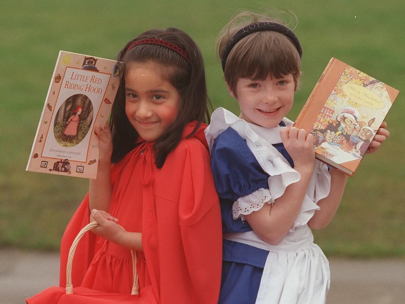 Pupils at St. Paul's Primary in Whinmoor dressed up for World Book Day in March 2000. Pictured with the books that inspired their outfits, are Nikita Panesar (Little Red Riding Hood) and Sophie de Marco (Alice in Wonderland).