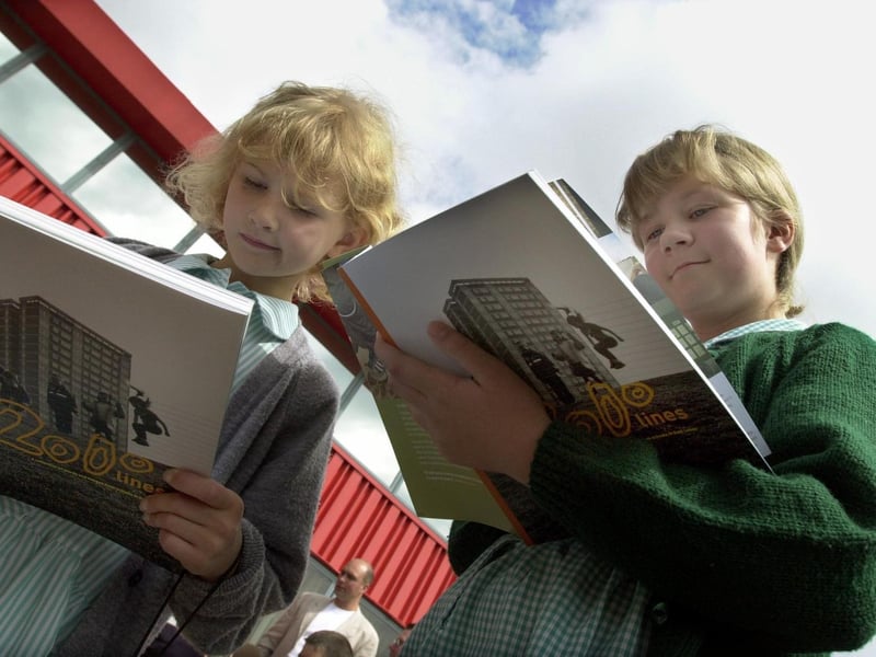 Nancy Edge and Lauren Turner, both pupils at St Paul's Primary in Whinmoor are pictured with the 2000 Lines book which was launched at Elida Faberge in Seacroft.