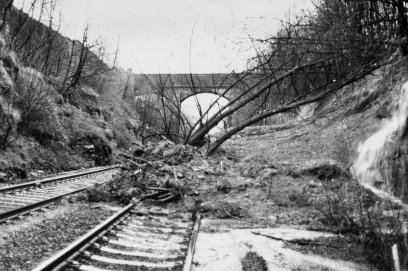 Landslide blocked the Halifax-Manchester line at Cooper House Bridge, near Mytholmroyd in 1975.