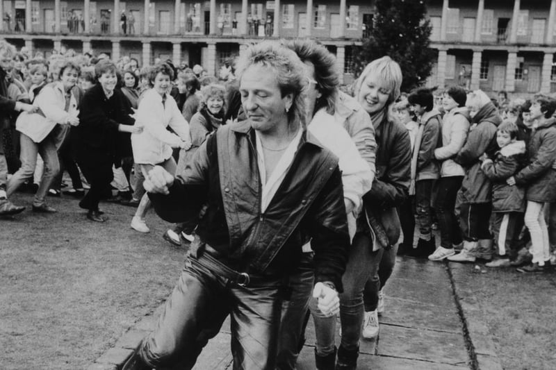 Black Lace lead the conga at Halifax Piece Hall in 1985.
