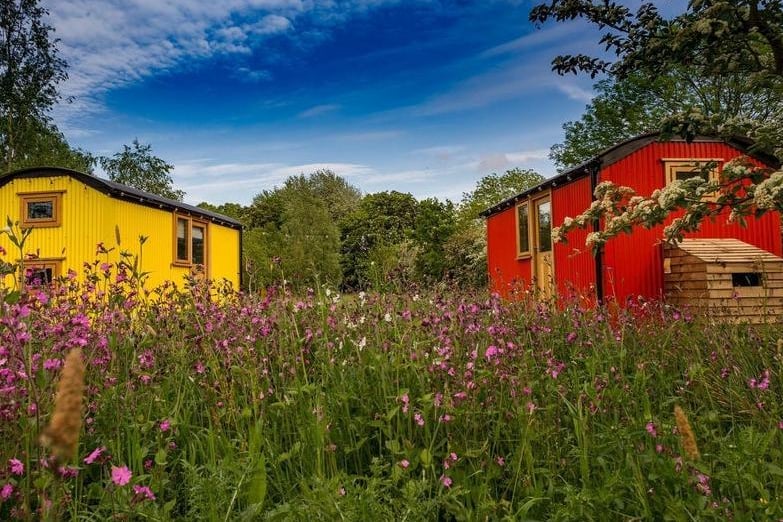 In the historic grounds of Samlesbury Hall sits a gathering of colourful huts - a rustic and carefree alternative to your traditional hotel room.
Each hut comes complete with two double beds in European oak, memory foam mattresses, low-wattage electricity to keep your phone charged, as well as a cosy en-suite.