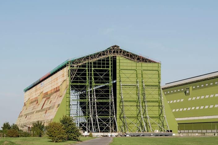 The Cardington Sheds - which were former Royal Air Force airship hangers - have been used extensively over the years for films. Most notably to Star Wars fans, the sheds have been used as the exteriors of the Yavin IV base in A New Hope and Rogue One.