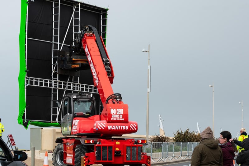 Machinery has been moving green screens and special effects equipment around Cleveleys prom today, with onlookers standing on the sidelines hoping to see some of the action. The filming is taking place from Cafe Cove up to the Prom and beach at Anchorsholme, with road closures and diversions in place until May 11.