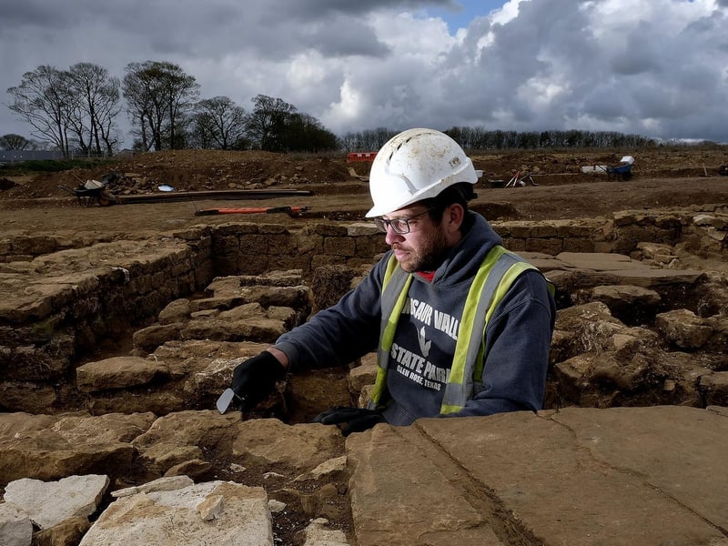 Field Archaeologist Martyn King inspects the site at Eastfield.