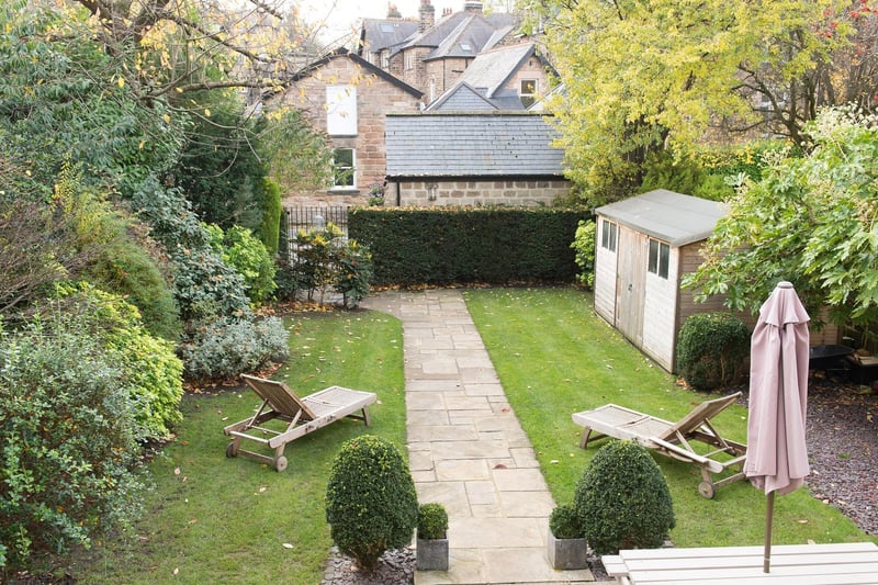 The property stands in landscaped lawned gardens and has a private garden.