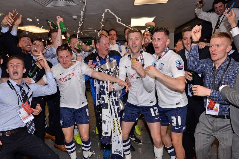 Paul Gallagher leads the dressing room celebrations after PNE's League One play-off final win at Wembley in May 2015.