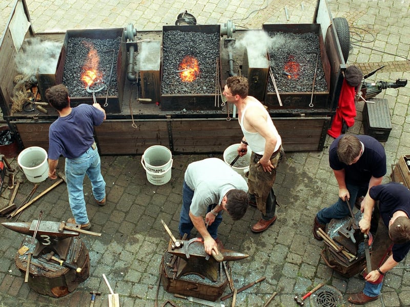 Farriers taking part in a horse shoeing competition held at Tetley's Brewery Wharf in the city centre.