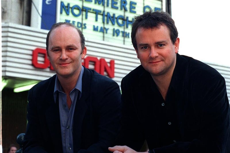 Two of the stars of Notting Hill - Tim McInnerny (left) and Hugh Bonneville - arrive at the Odeon cinema on The Headrow for the film's gala premiere.
