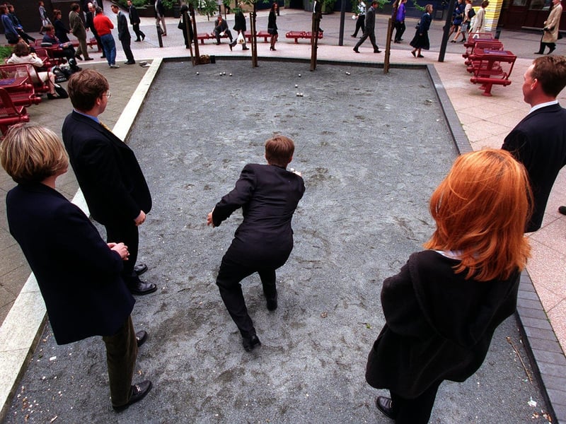 City workers take part in a boules masterclass at Bond Court to launch the second Leeds International Boules Contest.