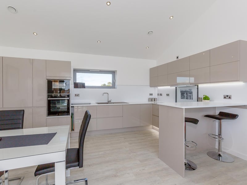 Workspace, storage facilities and dining areas within the kitchen