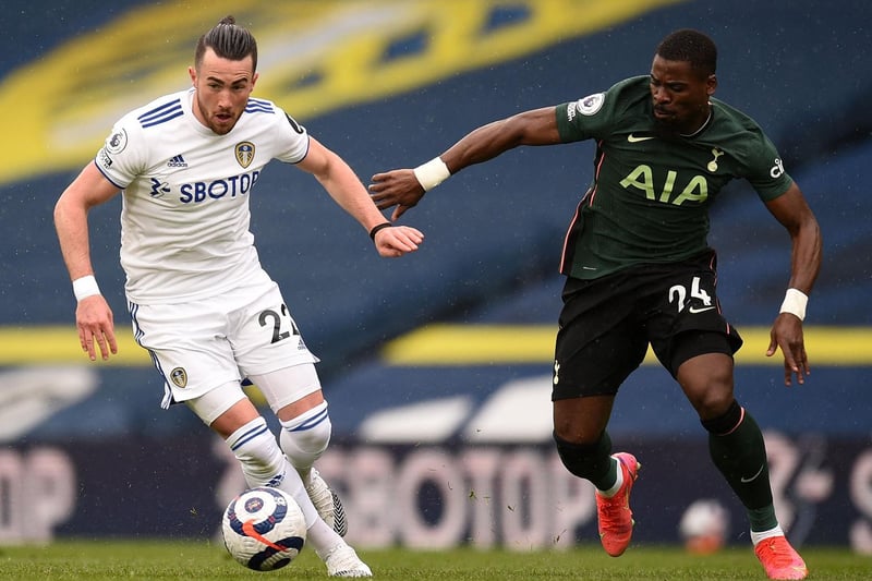 Leeds United's English midfielder Jack Harrison (C) vies for the ball against Tottenham Hotspur's Ivorian defender Serge Aurier (R) during the English Premier League football match at Elland Road in Leeds, northern England on May 8, 2021.