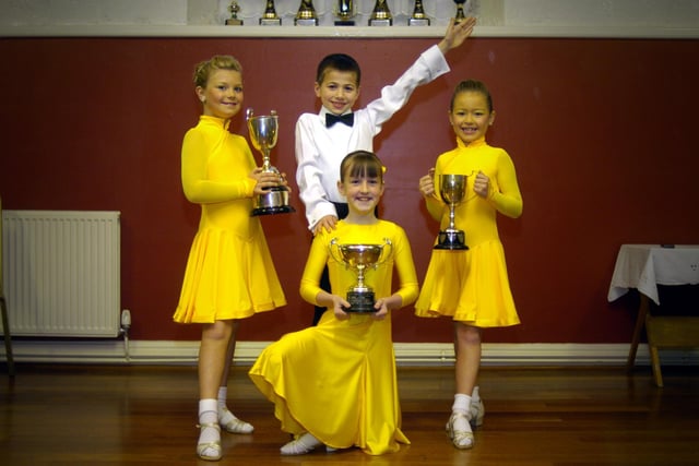 Ballroom dancing winners from LP Dance Centre, pictured with their trophies.