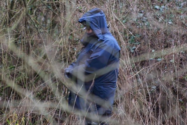Forensic specialists and police officers have been searching the area. Photo: Eddie Mitchell SUS-210129-130912001