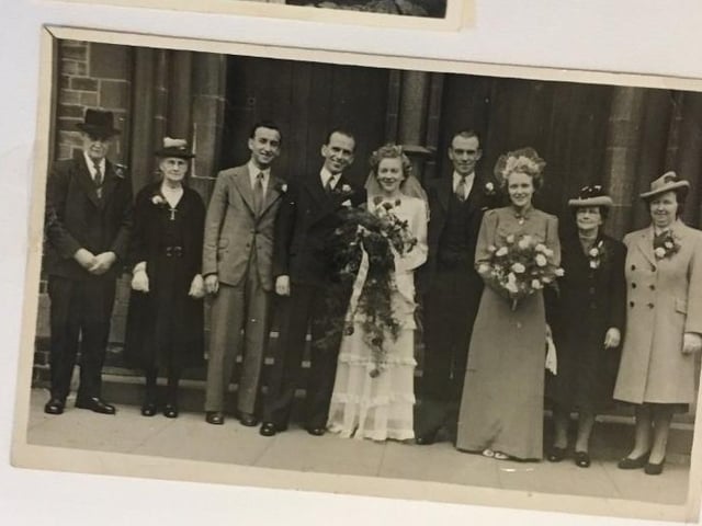 Jocelyn's Aunt Doreen's wedding. Charles is 4th from the right in between his daughters.