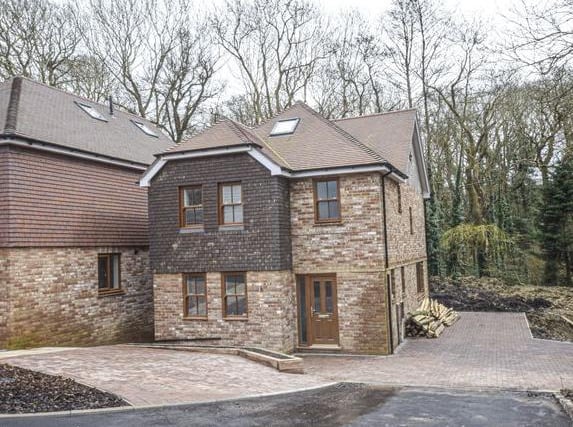 An elegantly-designed four-bedroom detached property, featuring oak doors throughout, double glazing, gas central heating and a host of high specification refinements. Price: £490,000