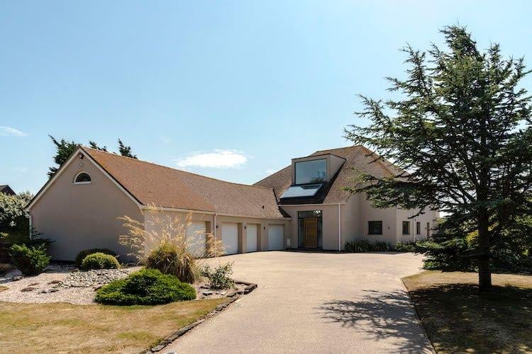 Light-filled four bedroom home with oversized triple-glazed windows everywhere to take full advantage of the sunshine in summer and the dramatic weather of autumn and winter. Price: £3,500,000.