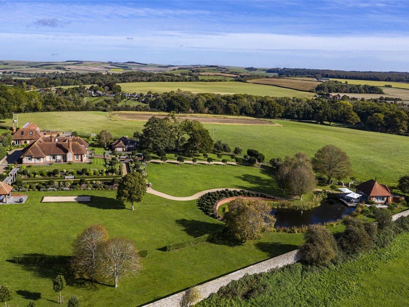 Stable Cottage was built on the site of the former stables to the Hunting Lodge of Arundel Castle and has an enviable location looking out over miles of open South Downs countryside. Price: £3,950,000.