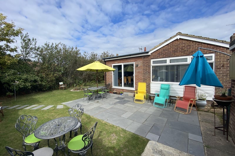 Extended and modernised two bedroom detached bungalow with a superb garden room. Price: £350,000.