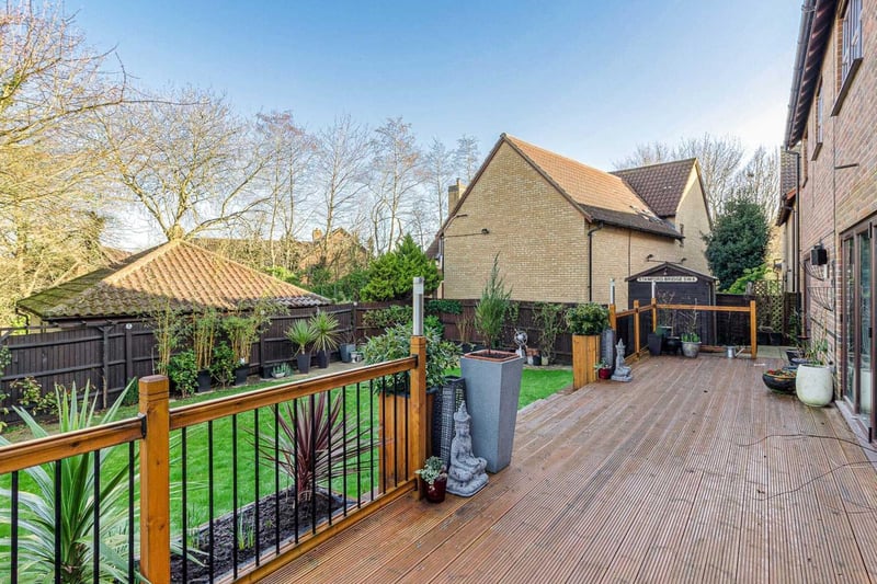 This second shot of the garden offers greater perspective on just how big the tiled area and garden is. In sunnier, safer times this area looks perfect for a BBQ.