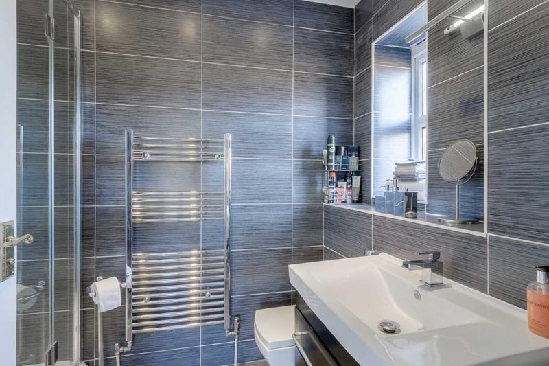 The second en-suite bathroom contains many of the features from the first bathroom, but contains a heated towel rather than a bath.