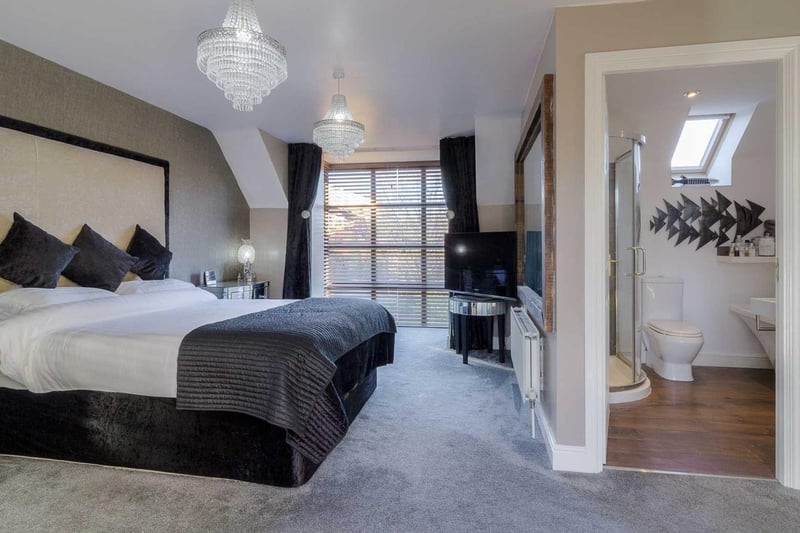 The master bedroom comes with a fully-functional en-suite bathroom that has a walk-in shower, heated towel rail, laminated flooring and a bath.