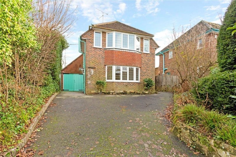This detached three bedroom 1930s family home is situated 0.2 miles from Haywards Heath railway station. Price: £600,000.