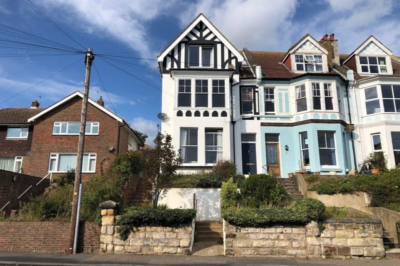 This large, five bedroom house was previously three flats which have been converted back into one large house, and is 0.1 miles from Hastings railway station. Price: £450,000.