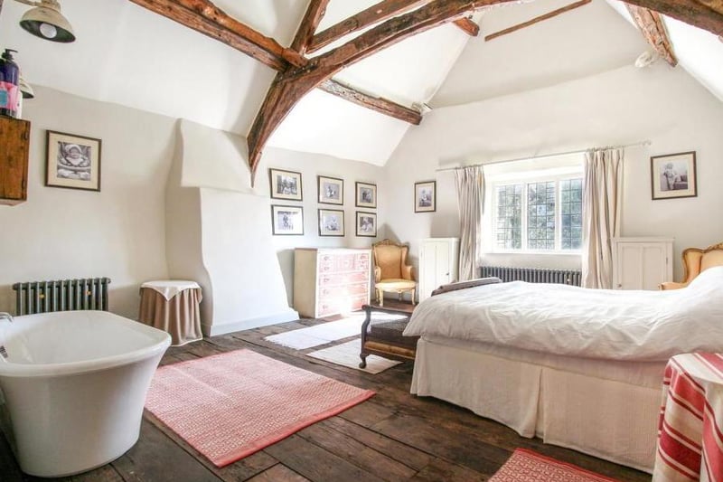 A bedroom inside the grade II listed property Abbey Lodge in Farthinghoe (photo from Rightmove)