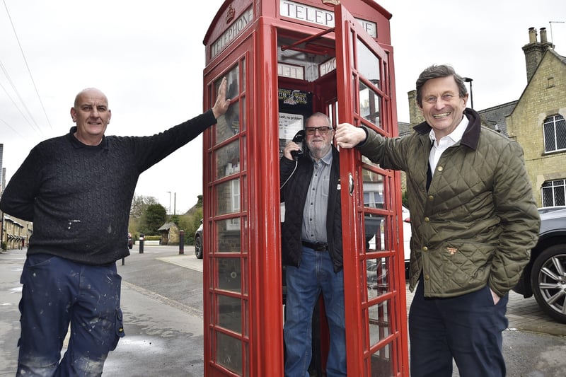Ward councillors  Nigel Simons, Richard Brown and Steve Allen at the telephone box at Wisbech Road, Thorney. EMN-210316-164759009