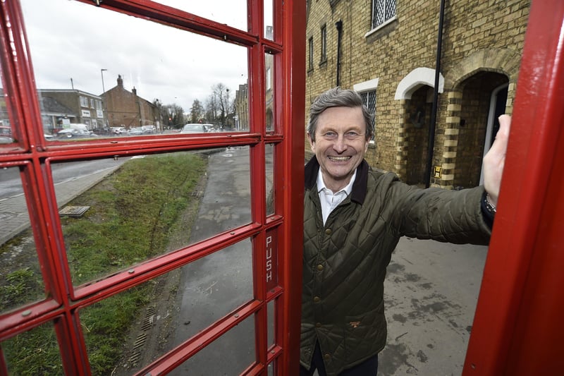 Ward councillor   Steve Allen at the telephone box at Wisbech Road, Thorney. EMN-210316-164715009