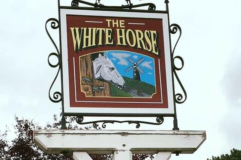 The White Horse, Sleaford. The pub serves the local area as one of the few remaining traditional locals' pubs in Sleaford, with wet sales only. The interior has been opened out into a single L-shaped room, but which still retains a cosy feel. Sports predominate, with both darts and pool teams. EMN-210317-171005001