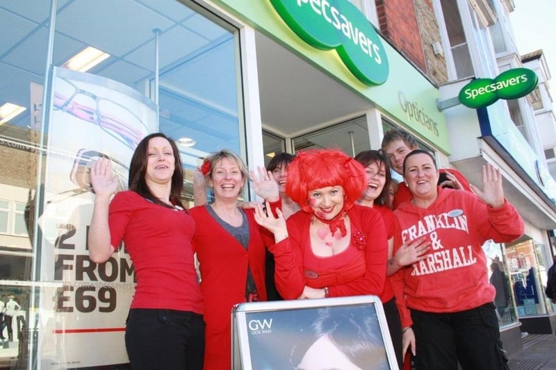 Staff at Specsavers, Skegness, all dressed in red.