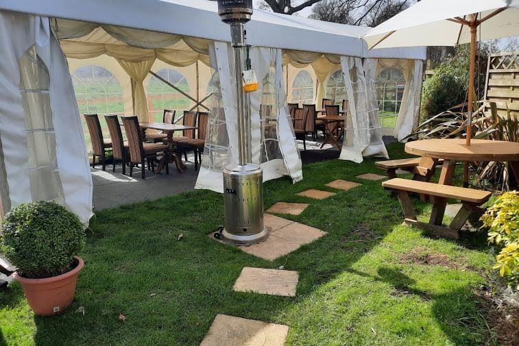 The Folly restaurant opposite Towcester Racecourse has an outdoor dining space with heaters and a marquee to protect customers from the elements!