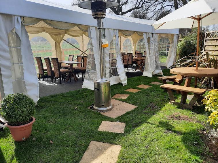 The Folly restaurant opposite Towcester Racecourse has an outdoor dining space with heaters and a marquee to protect customers from the elements!