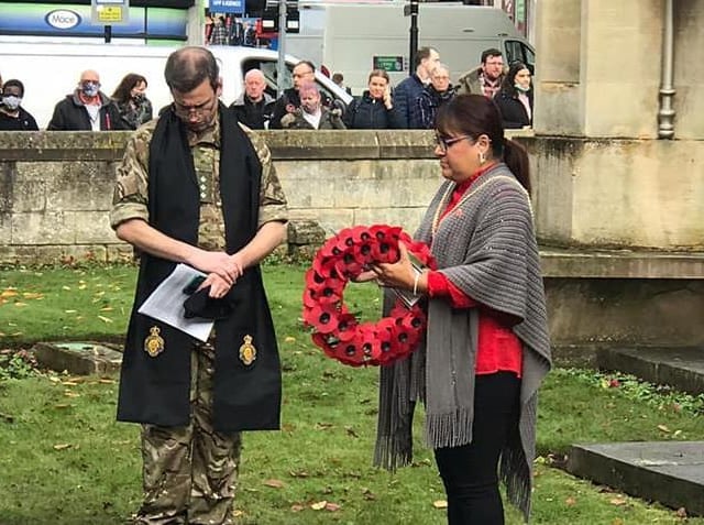 Mayor Councillor Rufia Ashraf at a service in the All Saints Church memorial garden.