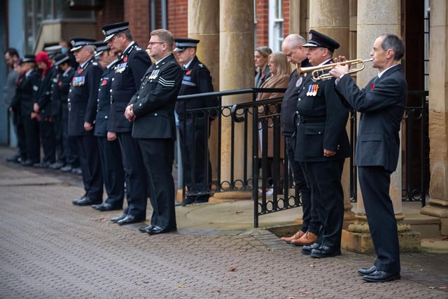 Chief Constable Nick Adderley leads his force as they pay their respects.