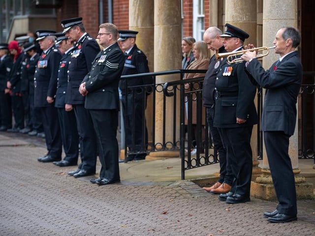 Chief Constable Nick Adderley leads his force as they pay their respects.