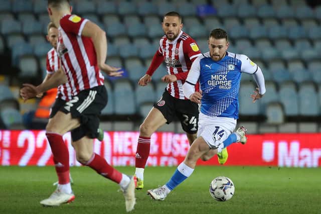 Posh's former Derby County star Jack Marriott in action.
