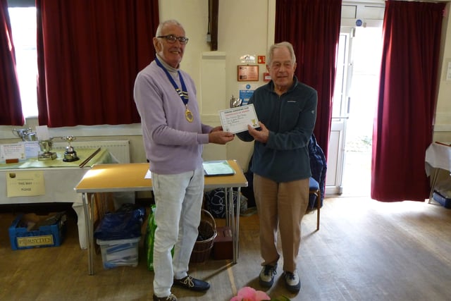 Jurg Klemenz was awarded the Malcolm Ford Trophy as the first prize winner for vase of garden flowers