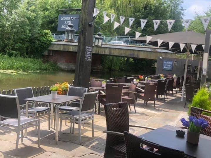 Greene King pub, The Britannia - on Bedford Road - in Northampton has a beautiful garden nestled on the banks of the winding River Nene so you can enjoy an ice cold pint as you watch the canal boats pass by.